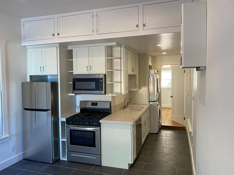 EXTRA STORAGE CABINETS ABOVE KITCHEN