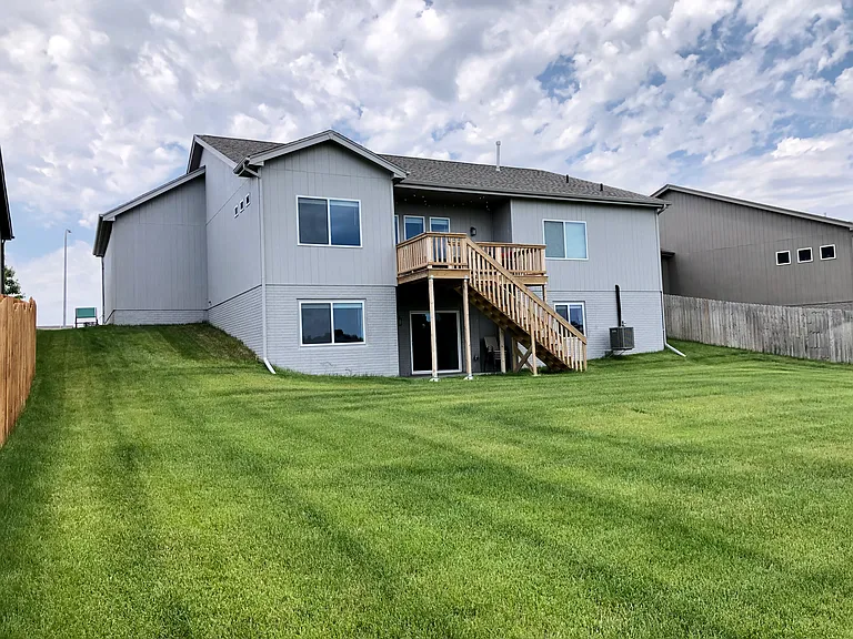 Back view of the house and backyard