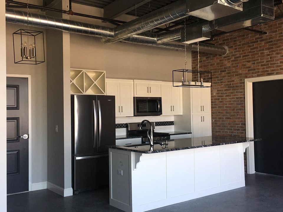 Full size refrigerator, spacious open kitchen
