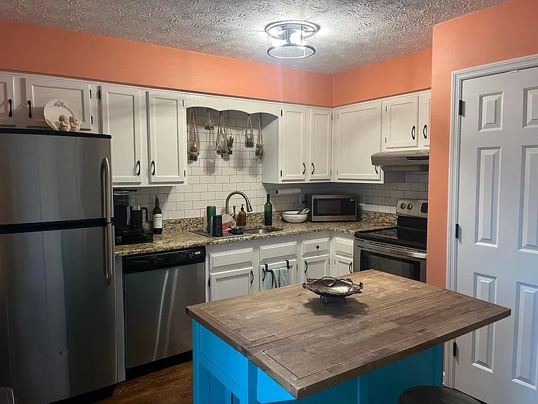 Kitchen, rollaway island included in rental. (13x12)