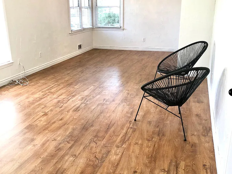 Open plan living & dining rooms. New vinyl flooring and lighting. 2" blinds throughout.