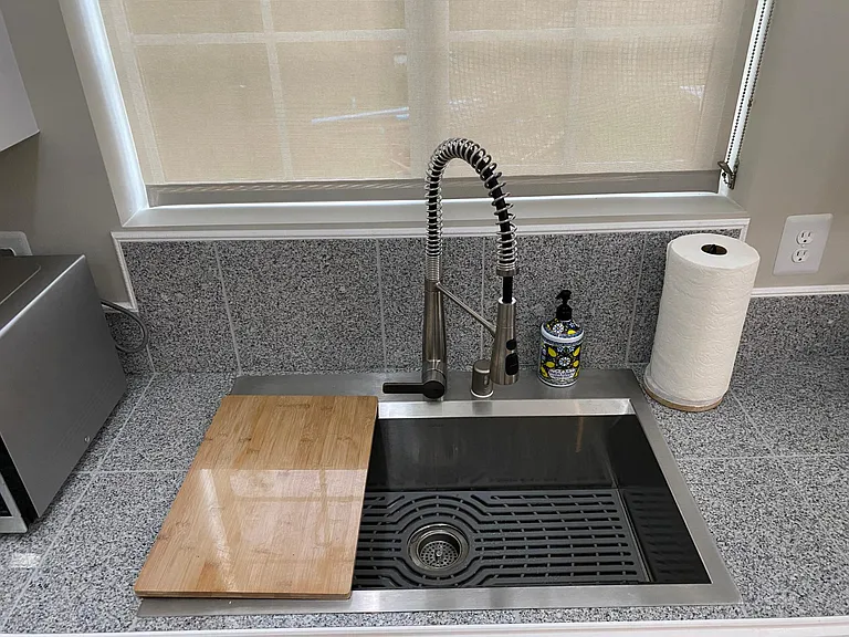 Stainless steel kitchen sink.