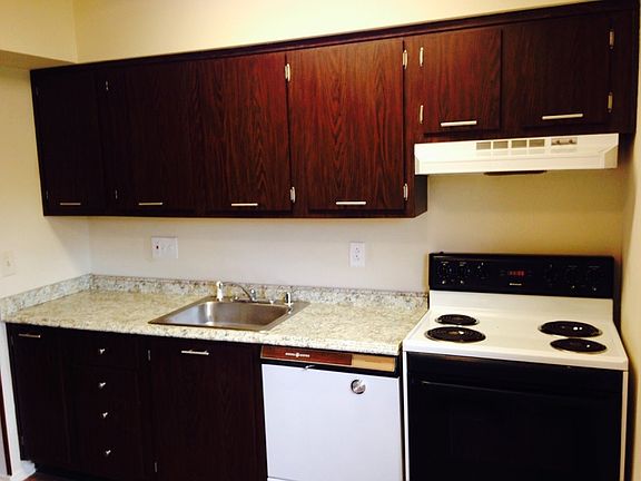 Kitchen Includes stove, fridge, & dishwasher