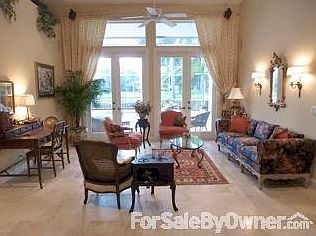 Living Room
						:
						New Jerusalem/Limestone Flooring, French doors to Patio. 12 foot ceiling.