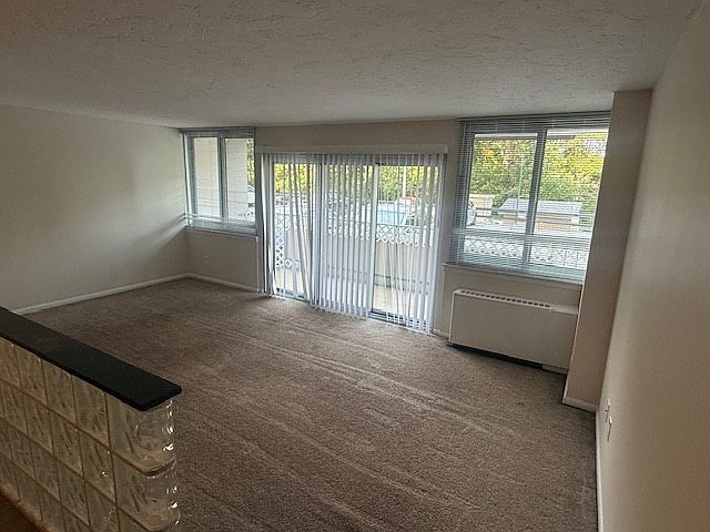 Living room with sliding doors to balcony