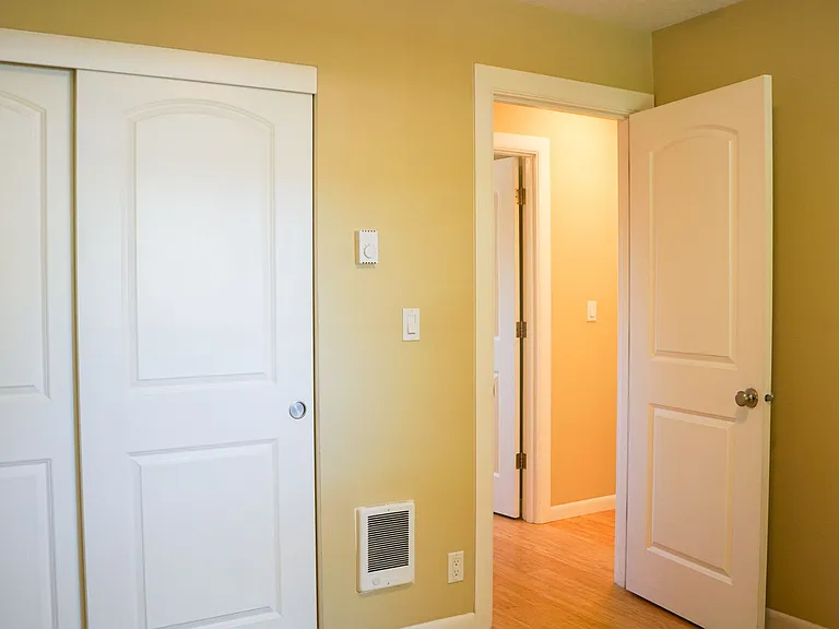 Top-Floor 2-Bedroom with Bamboo Flooring + Off-Street Parking! — Photo 10