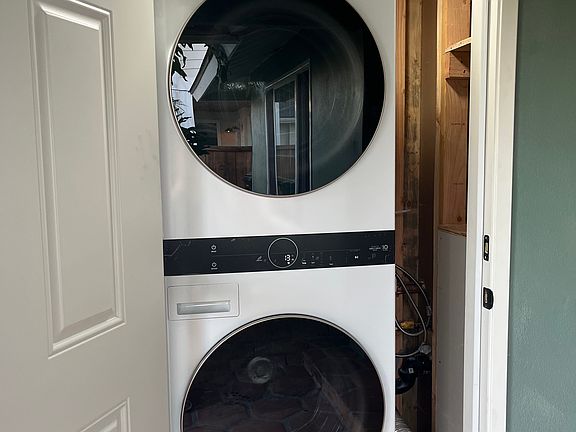 Brand new LG laundry tower. Small area for laundry soap. Lockable door.