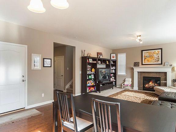 Breakfast nook tucked in nicely. Note the hardwoods throughout