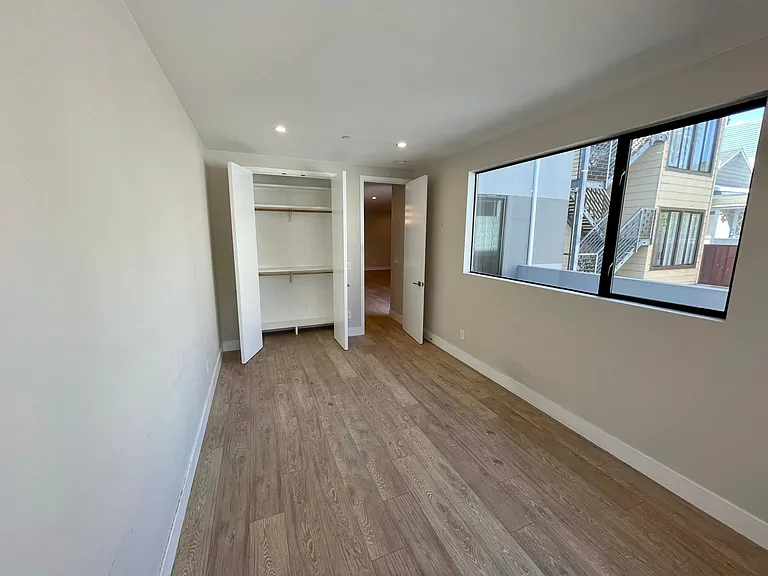 Large closet in rear bedroom, all closets have multiple shelves/ rods