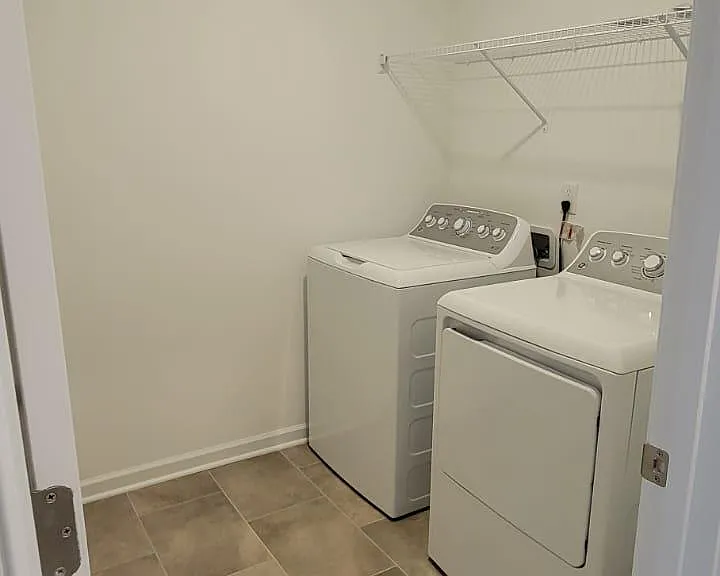 Laundry room on the second floor - New washer and dryer
