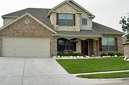 Beautiful custom home, stone facia, cedar post with porch, fantastic curb appe