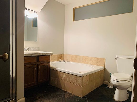 Full bath with jet tub and shower