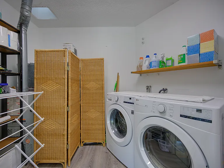 Laundry, water heater and heating system with storage