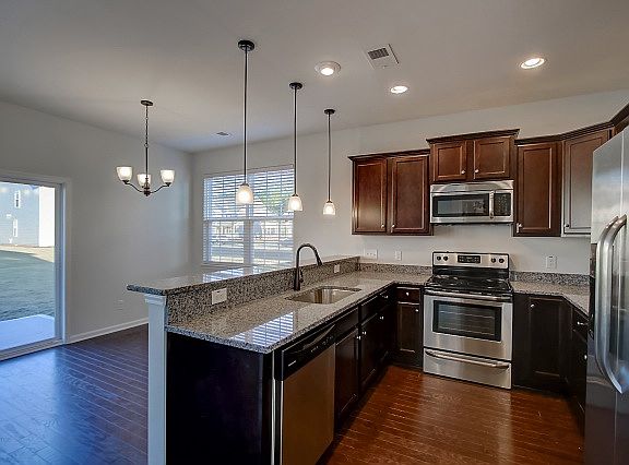 From garage entrance. Laundry room with new washer/dryer.