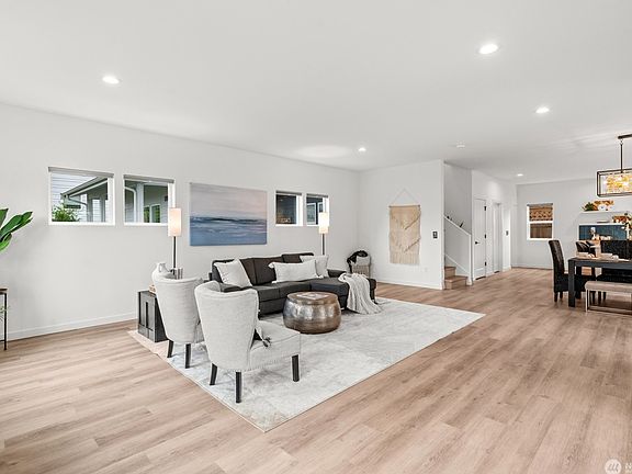 Living room with LVP flooring throughout.