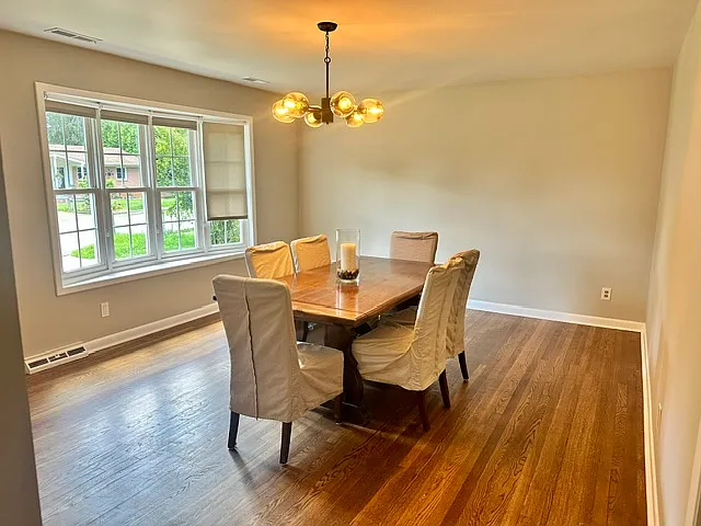 Dining room with front facing picture window.