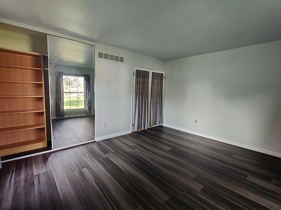 Master bedroom. Large closet with two mirror sliding doors. Closet is twice the length of the pictured mirror.