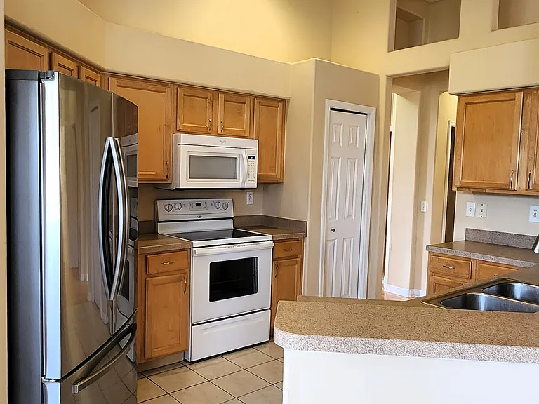 kitchen, with new refrigerator and dishwasher