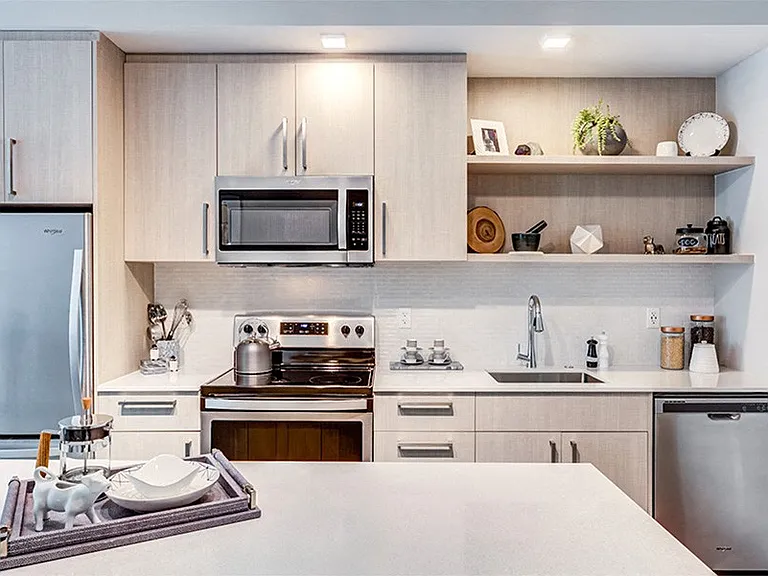 Premium white quartz countertops in kitchens and bathrooms