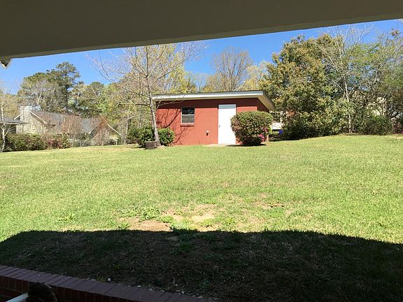 back yard with utility shed with electricity