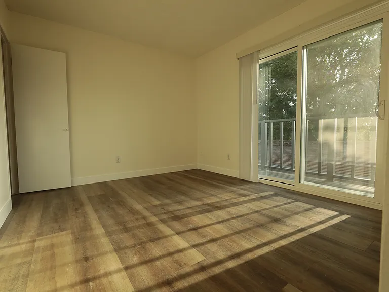 upstairs bedroom 1 with balcony