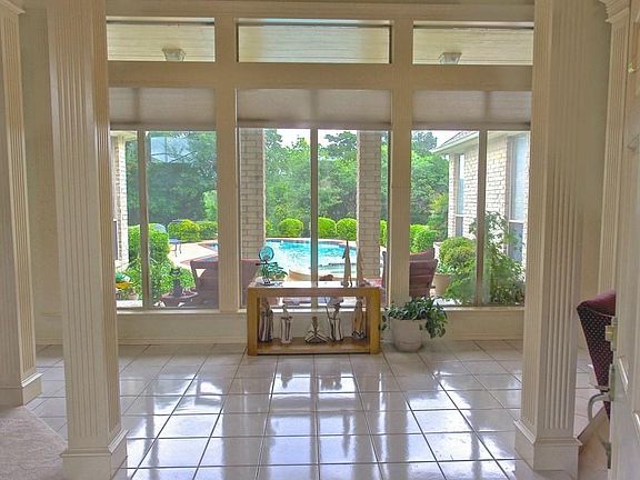 Pool view from front entry open to formals