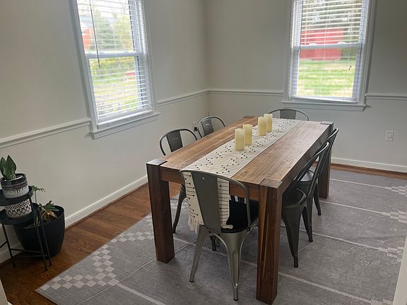 dining room that opens into family room and kitchen