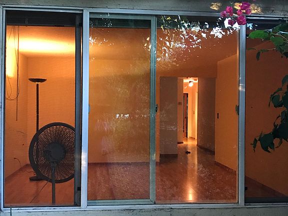 View of livingroom from front yard.