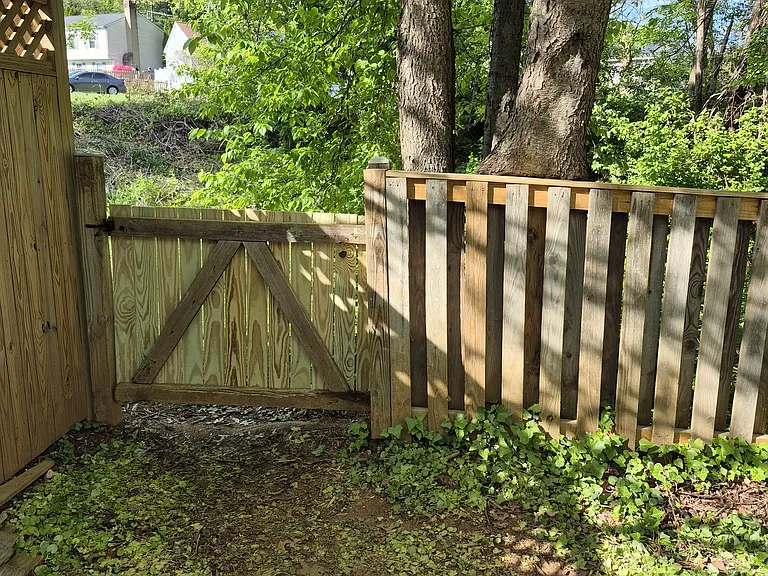 Fenced yard. Large common grounds outside fence--maintained by Baltimore County