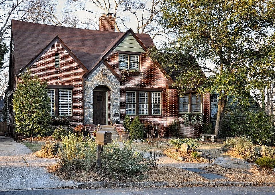 Brick Tudor with nicely landscaped yard