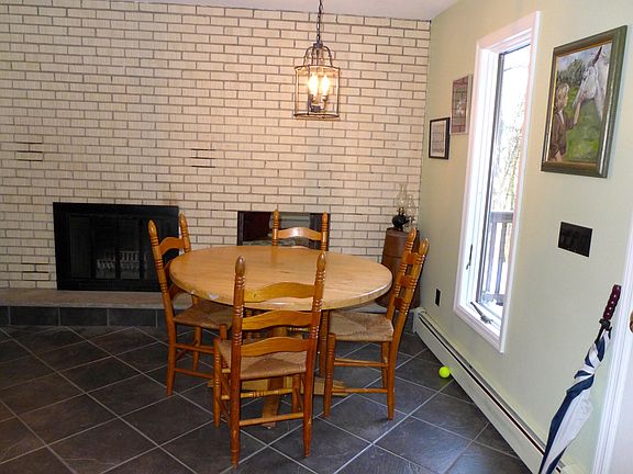 Fireplace in eating area 