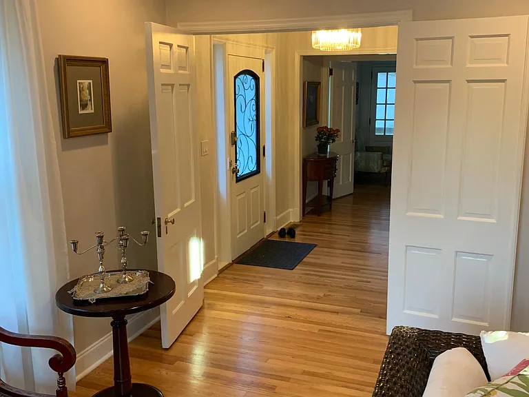 Living room looking into front foyer/ door