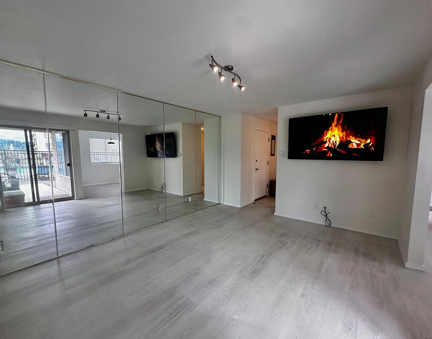 Updated 2-Bedroom Condo with Water Views, 2 Parking Spaces & Poolside Location — Photo 2