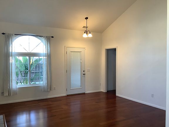 Living room with door to back yard.