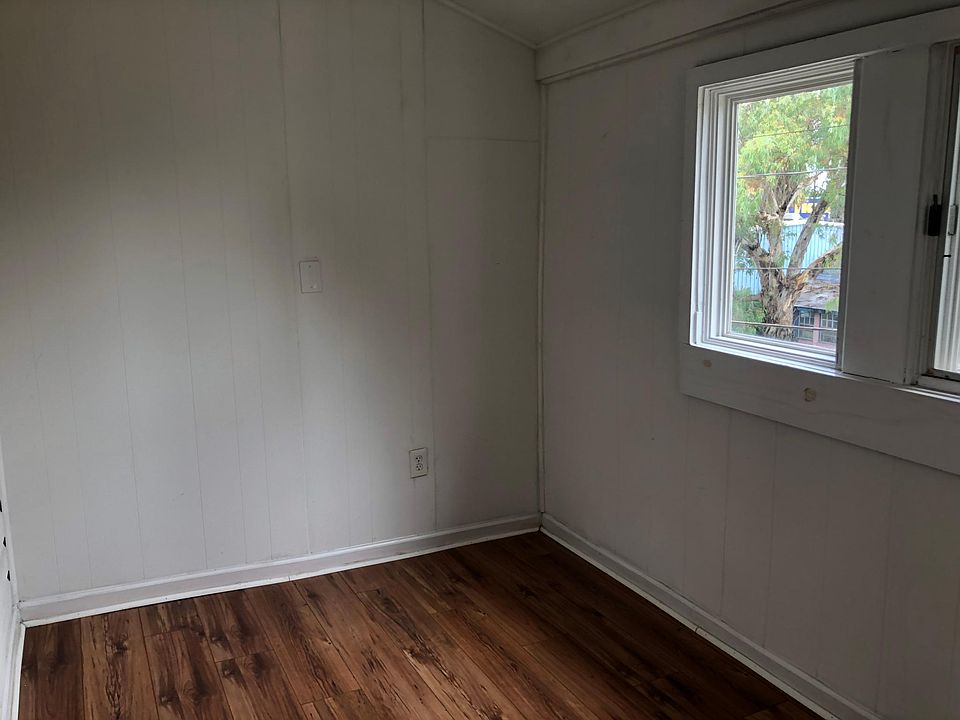 Bedroom that faces out towards street.