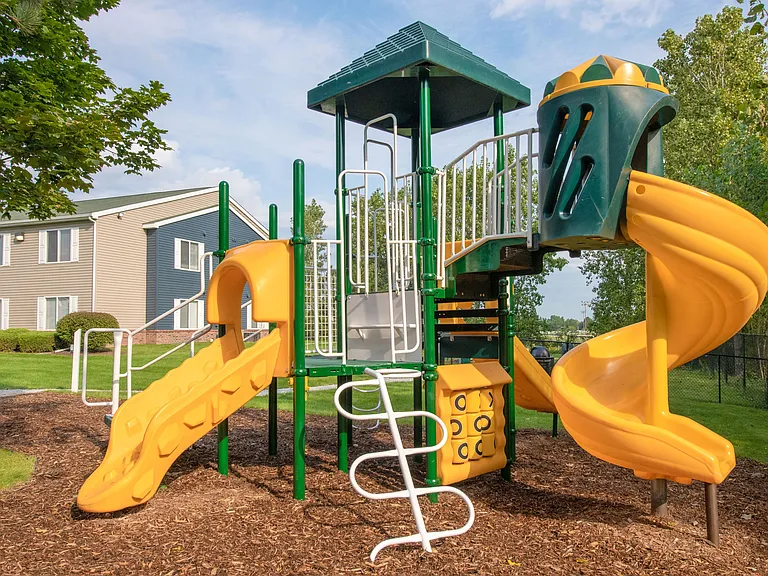 Kids will love our colorful playground featuring slides and climbing structures for outdoor fun, professionally operated by Highlands Vista Group.