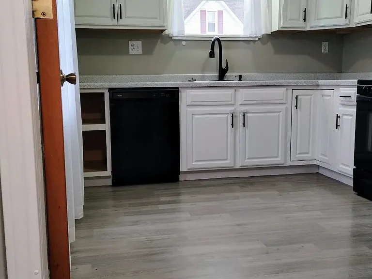 Kitchane has stove, refrigerator, micowave