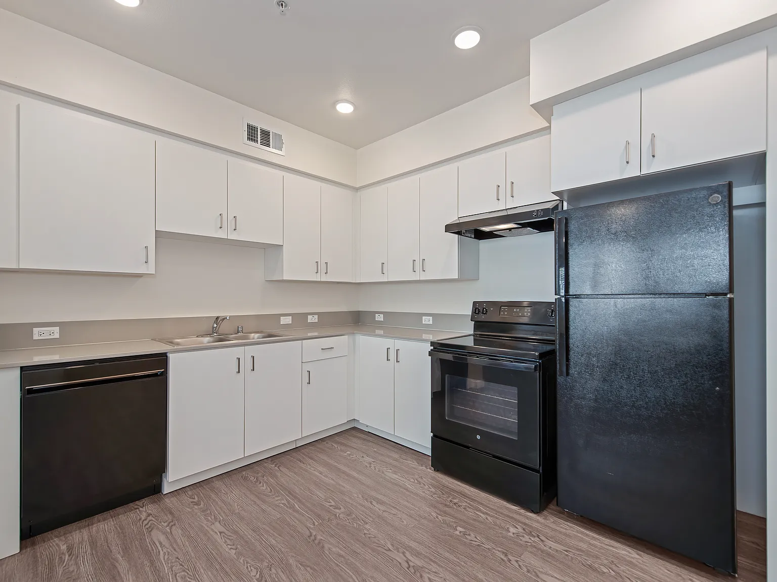 First Point Apartments — Photo 1