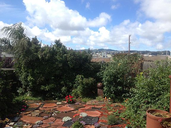 Back yard, quiet and flower-filled