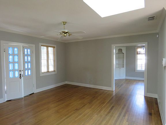 Living room, with view into dining room.