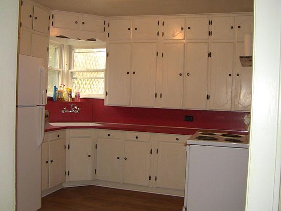 Cheery kitchen has stove, refrigerator, new sink, LOTS of ca