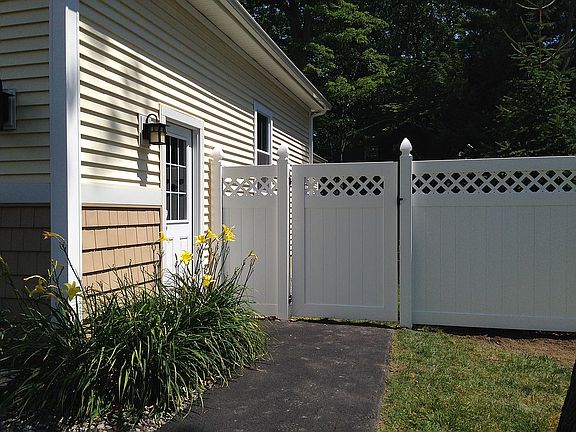 Side garage entrance, fence