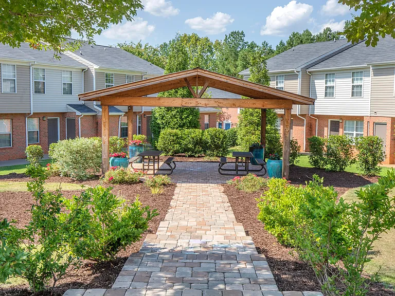 Stroll the inviting paved pathway to our picturesque picnic pavilion for outdoor feasts with friends.