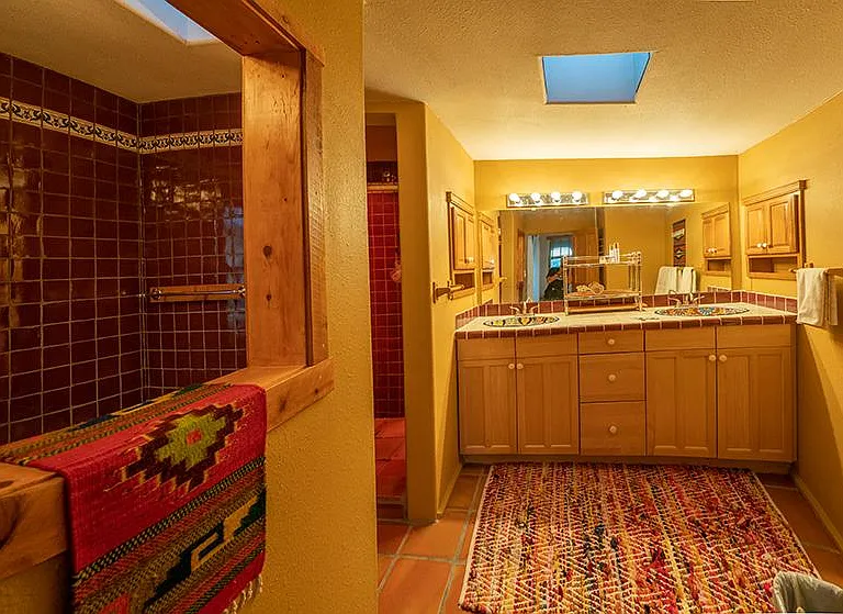 Master bathroom with shower and spa tub