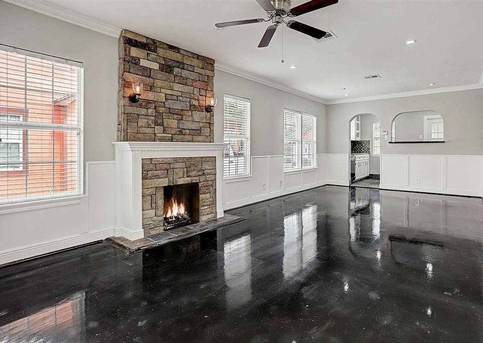 EACH ROOM OF THIS UNIQUE JEWEL BOX IS FILLED WITH AN ABUNDANCE OF NATURAL LIGHT! THE HOME IS FRESHLY PAINTED IN A WARM INVITING TONE & ITS GLEEMING FLOORS WERE RECENTLY REFINISHED IN 8/2019.