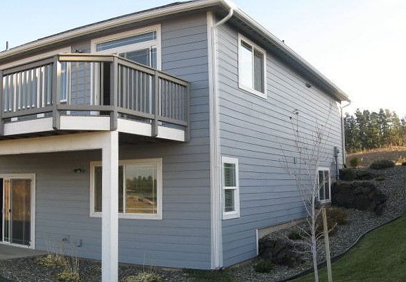 Back of home with Deck