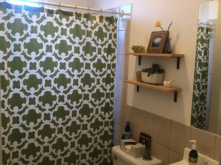 Sunny, vented bath.