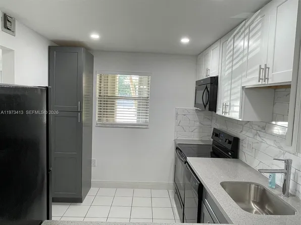 8390 Sands Point Blvd APT 107F, Tamarac, FL 33321
