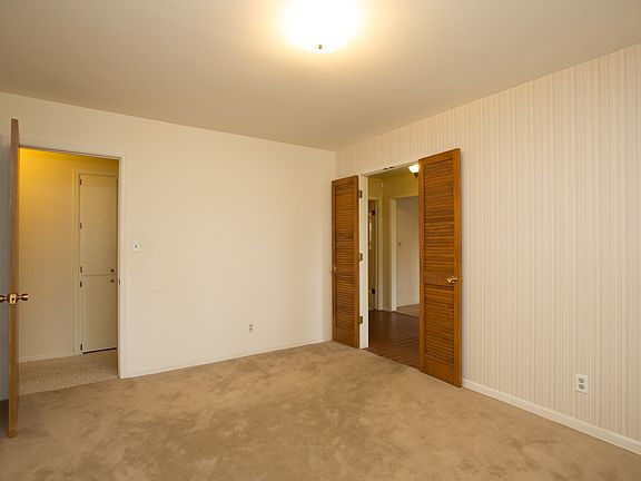 Panaled Wall, Carpet & Shutter Doors