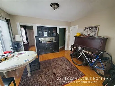 "Charming 1-Bedroom Oasis with Hardwood Elegance at 222 Logan Ave N, Minneapolis!" — Photo 4